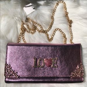 Metallic pink handbag